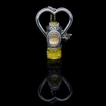 Load image into Gallery viewer, Fountain Sunset Rollerball Necklace Series - Amber &amp; Yellow Rutilated Quartz on Black Leaf Pattern
